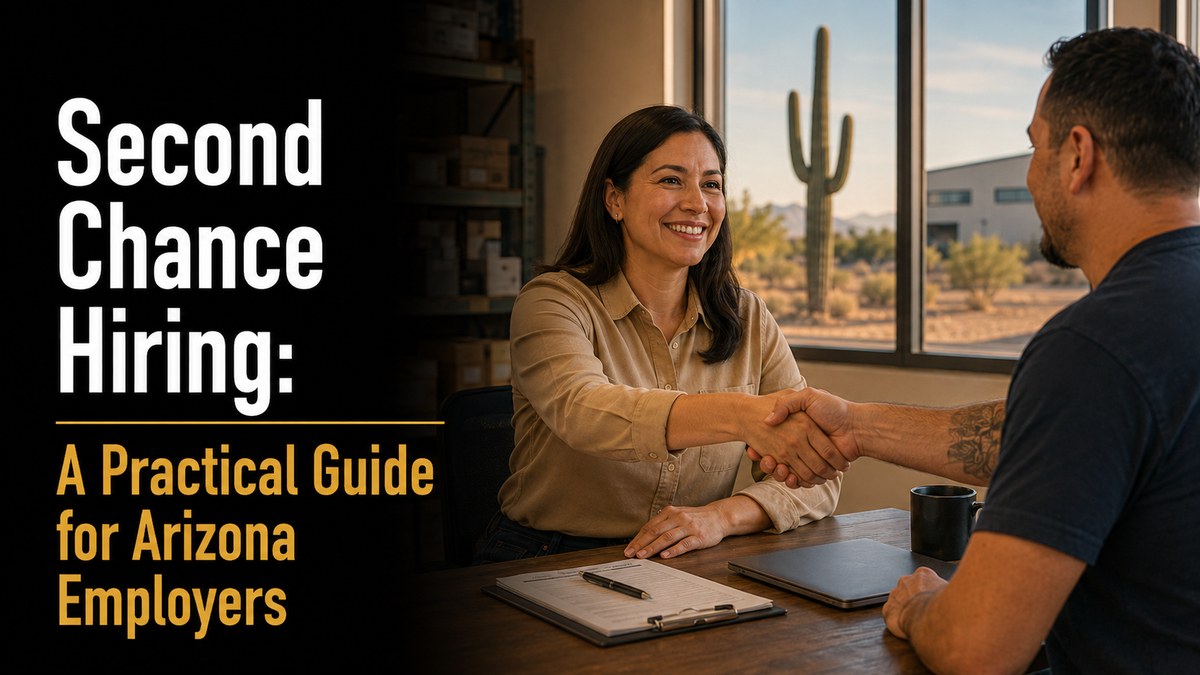 A firm handshake across a desk in a small business office